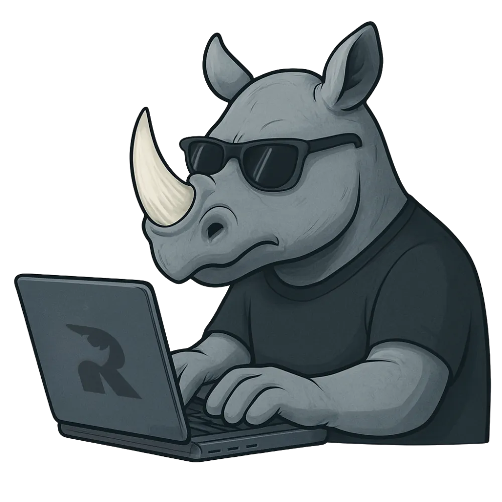 The Rhino Websites mascot working on a laptop